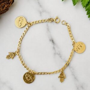 Gold charm bracelet with coin and hamsa